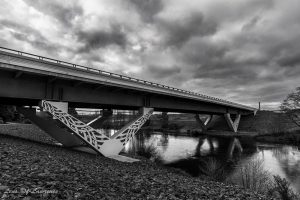 A bridge over the Waikato River adorned with Maori markings