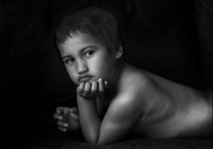 Using the portrait photography tips described here to take this fine art shot of a young boy