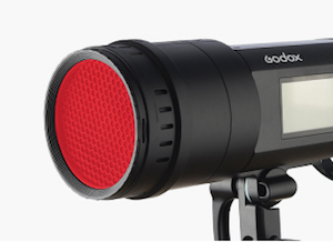Godox AD$00Pro will take adapters for a wide range of accessories such as the red filter shown here