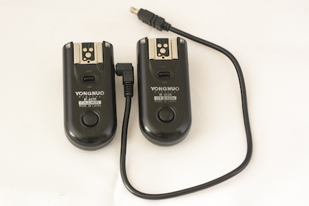 A pair of Yongnuo RF-603N remote shutter releases with N cable for connecting to the camera