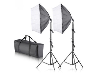 A Photography lighting kit for the studio or for out in the field showing two light stands and the carry bag
